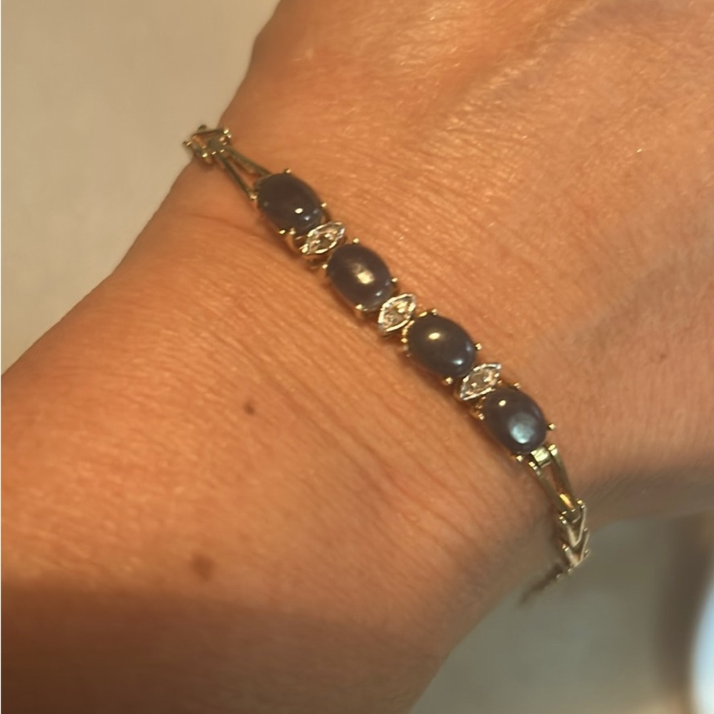 4 sapphires and diamond set in a 18k gold plated silver bracelet